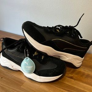 NWT Puma black and gold soft foam shoes